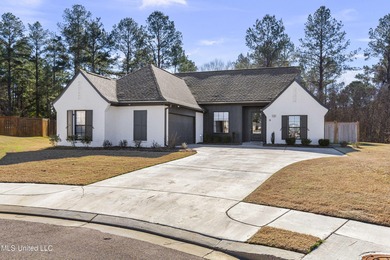 Like-new 3-bedroom, 2-bath home in Pinehurst of Lake Caroline on Lake Caroline Golf Club in Mississippi - for sale on GolfHomes.com, golf home, golf lot