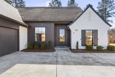 Like-new 3-bedroom, 2-bath home in Pinehurst of Lake Caroline on Lake Caroline Golf Club in Mississippi - for sale on GolfHomes.com, golf home, golf lot