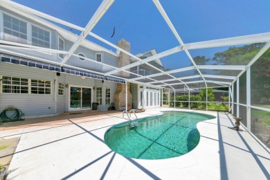 LAKEFRONT LIVING IN GATED SOUTHWIND - ROOM TO UPDATE, VIEWS TO on Golf Club at Bluewater Bay Resort in Florida - for sale on GolfHomes.com, golf home, golf lot