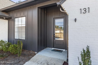 Like-new 3-bedroom, 2-bath home in Pinehurst of Lake Caroline on Lake Caroline Golf Club in Mississippi - for sale on GolfHomes.com, golf home, golf lot