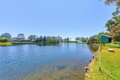 LAKEFRONT LIVING IN GATED SOUTHWIND - ROOM TO UPDATE, VIEWS TO on Golf Club at Bluewater Bay Resort in Florida - for sale on GolfHomes.com, golf home, golf lot