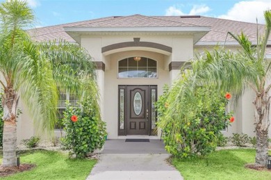 Stunning Lakefront Estate Home!!  With a 3-way split floorplan on Wedgefield Golf Club in Florida - for sale on GolfHomes.com, golf home, golf lot