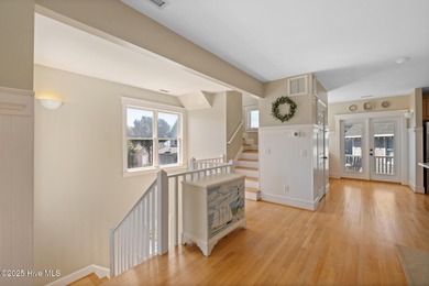 This exquisite high-dunes cottage exudes coastal charm with on Bald Head Island Golf Club in North Carolina - for sale on GolfHomes.com, golf home, golf lot