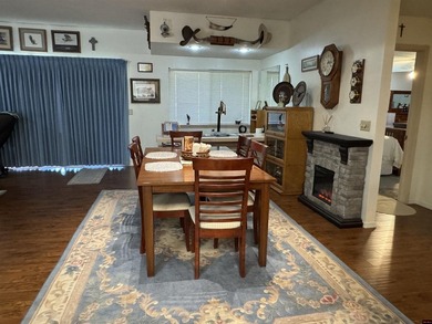 This stunning 2,665 sq ft home offers 3 bedrooms and 3 and a on Twin Lakes Golf Club in Arkansas - for sale on GolfHomes.com, golf home, golf lot