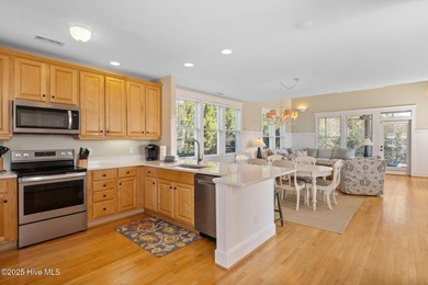 This exquisite high-dunes cottage exudes coastal charm with on Bald Head Island Golf Club in North Carolina - for sale on GolfHomes.com, golf home, golf lot