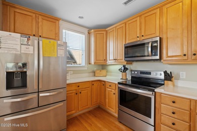 This exquisite high-dunes cottage exudes coastal charm with on Bald Head Island Golf Club in North Carolina - for sale on GolfHomes.com, golf home, golf lot