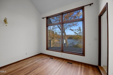 Gorgeous Lakefront estate! From the moment you enter, you're on River Golf and Country Club at Lake Royale in North Carolina - for sale on GolfHomes.com, golf home, golf lot