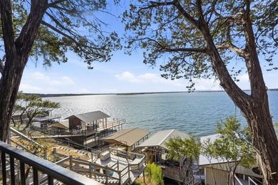 Nestled within the exclusive, amenity-rich community of on De Cordova Bend Country Club in Texas - for sale on GolfHomes.com, golf home, golf lot