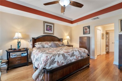 Welcome to Watercrest, an elegant gated lakefront condominium on Legacy Golf Club in Florida - for sale on GolfHomes.com, golf home, golf lot