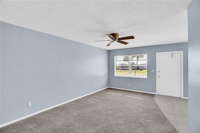 Welcome to easy Florida living at 105 Spring Lake Ct. #203 in on The American Golf Club in Florida - for sale on GolfHomes.com, golf home, golf lot