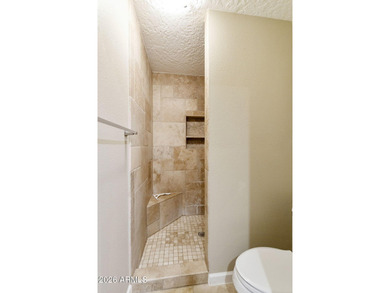 Welcome to this beautifully updated home in the highly desirable on Fountain of the Sun Country Club in Arizona - for sale on GolfHomes.com, golf home, golf lot