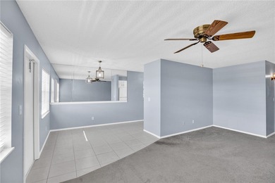 Welcome to easy Florida living at 105 Spring Lake Ct. #203 in on The American Golf Club in Florida - for sale on GolfHomes.com, golf home, golf lot