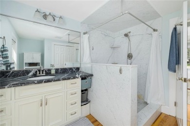 Walk to four beaches and a variety of recreational amenities on Potowomut Golf Club in Rhode Island - for sale on GolfHomes.com, golf home, golf lot
