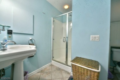This beautiful 3-bedroom 2 bath end unit located on the golf on Minerals Golf Club in New Jersey - for sale on GolfHomes.com, golf home, golf lot