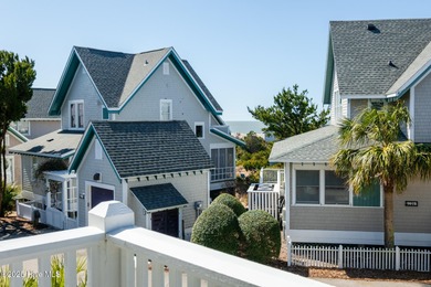 This exquisite high-dunes cottage exudes coastal charm with on Bald Head Island Golf Club in North Carolina - for sale on GolfHomes.com, golf home, golf lot