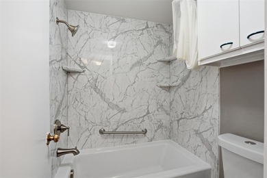 Nestled within the exclusive, amenity-rich community of on De Cordova Bend Country Club in Texas - for sale on GolfHomes.com, golf home, golf lot