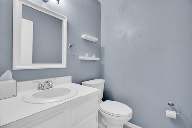 Welcome to easy Florida living at 105 Spring Lake Ct. #203 in on The American Golf Club in Florida - for sale on GolfHomes.com, golf home, golf lot