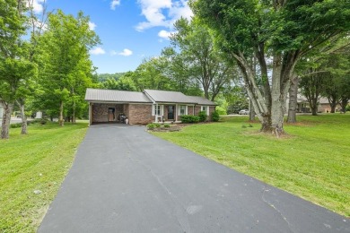 Charming home nestled in Hidden Valley. Only a few steps away on Hidden Valley Golf and Country Club in Tennessee - for sale on GolfHomes.com, golf home, golf lot
