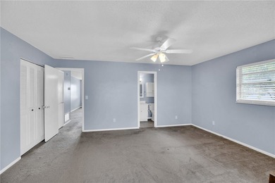 Welcome to easy Florida living at 105 Spring Lake Ct. #203 in on The American Golf Club in Florida - for sale on GolfHomes.com, golf home, golf lot