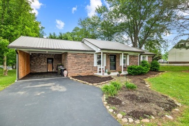 Charming home nestled in Hidden Valley. Only a few steps away on Hidden Valley Golf and Country Club in Tennessee - for sale on GolfHomes.com, golf home, golf lot