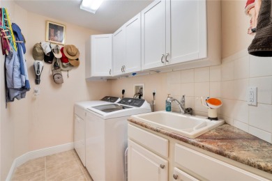 Welcome to Watercrest, an elegant gated lakefront condominium on Legacy Golf Club in Florida - for sale on GolfHomes.com, golf home, golf lot