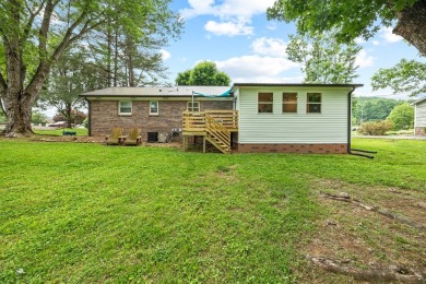 Charming home nestled in Hidden Valley. Only a few steps away on Hidden Valley Golf and Country Club in Tennessee - for sale on GolfHomes.com, golf home, golf lot