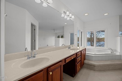 Gorgeous Lakefront estate! From the moment you enter, you're on River Golf and Country Club at Lake Royale in North Carolina - for sale on GolfHomes.com, golf home, golf lot