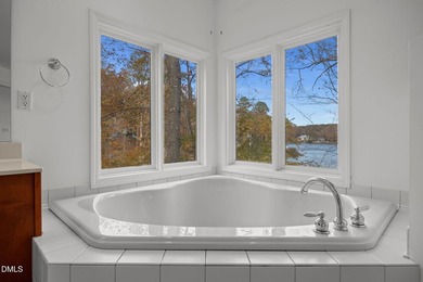 Gorgeous Lakefront estate! From the moment you enter, you're on River Golf and Country Club at Lake Royale in North Carolina - for sale on GolfHomes.com, golf home, golf lot