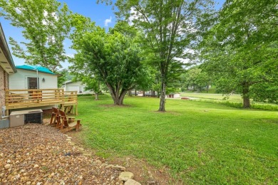 Charming home nestled in Hidden Valley. Only a few steps away on Hidden Valley Golf and Country Club in Tennessee - for sale on GolfHomes.com, golf home, golf lot