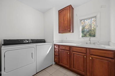 Gorgeous Lakefront estate! From the moment you enter, you're on River Golf and Country Club at Lake Royale in North Carolina - for sale on GolfHomes.com, golf home, golf lot