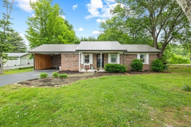 Charming home nestled in Hidden Valley. Only a few steps away on Hidden Valley Golf and Country Club in Tennessee - for sale on GolfHomes.com, golf home, golf lot