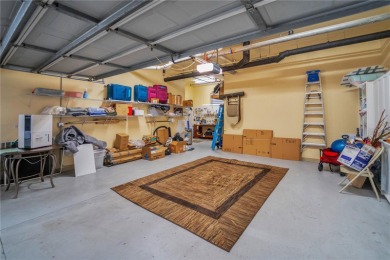 Welcome to Watercrest, an elegant gated lakefront condominium on Legacy Golf Club in Florida - for sale on GolfHomes.com, golf home, golf lot