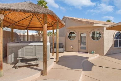 This beautiful and well cared for home, features a large on Desert Lakes Golf Course in Arizona - for sale on GolfHomes.com, golf home, golf lot