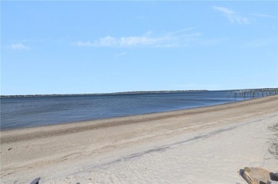 Walk to four beaches and a variety of recreational amenities on Potowomut Golf Club in Rhode Island - for sale on GolfHomes.com, golf home, golf lot