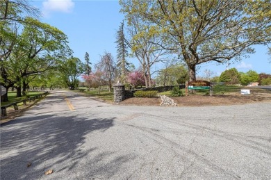 Walk to four beaches and a variety of recreational amenities on Potowomut Golf Club in Rhode Island - for sale on GolfHomes.com, golf home, golf lot