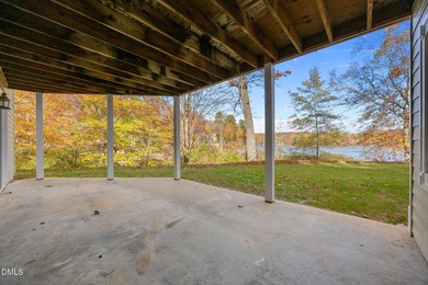 Gorgeous Lakefront estate! From the moment you enter, you're on River Golf and Country Club at Lake Royale in North Carolina - for sale on GolfHomes.com, golf home, golf lot