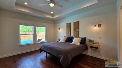 Luxury Living in the SPI Golf Course Community- A stunning on South Padre Island Golf Club in Texas - for sale on GolfHomes.com, golf home, golf lot