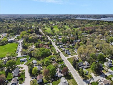 Walk to four beaches and a variety of recreational amenities on Potowomut Golf Club in Rhode Island - for sale on GolfHomes.com, golf home, golf lot