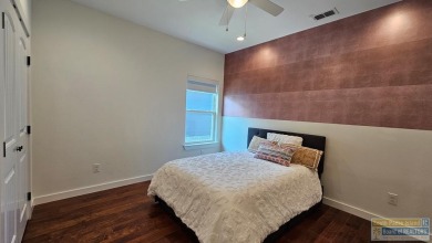 Stunning 4BR/3BA, 1,986 sq ft (per appraiser) home in the gated on South Padre Island Golf Club in Texas - for sale on GolfHomes.com, golf home, golf lot