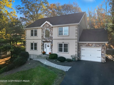 WELCOME TO 104 WOLF HOLLOW RD, A GOLF LOVERS DREAM!! Situated on Split Rock Resort and Country Club in Pennsylvania - for sale on GolfHomes.com, golf home, golf lot