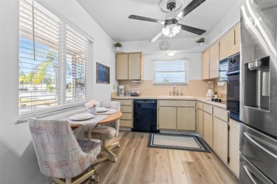 Enjoy the Florida lifestyle in this charming 2-bedroom, 2-bath on North Lakes Golf Course in Florida - for sale on GolfHomes.com, golf home, golf lot