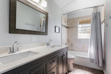This beautiful hilltop home offers fantastic views of nearby on Apple Rock Golf Course - Horseshoe Bay in Texas - for sale on GolfHomes.com, golf home, golf lot