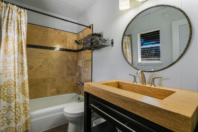 This beautiful hilltop home offers fantastic views of nearby on Apple Rock Golf Course - Horseshoe Bay in Texas - for sale on GolfHomes.com, golf home, golf lot