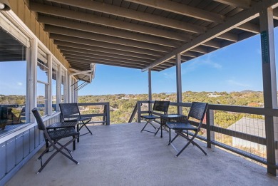 This beautiful hilltop home offers fantastic views of nearby on Apple Rock Golf Course - Horseshoe Bay in Texas - for sale on GolfHomes.com, golf home, golf lot