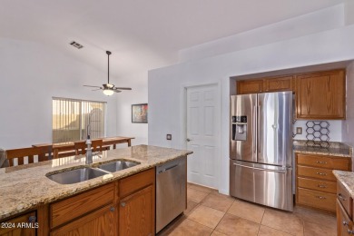 Seize the opportunity to own this bright and inviting pool home on The Legend at Arrowhead in Arizona - for sale on GolfHomes.com, golf home, golf lot