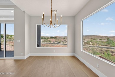 Experience breathtaking views of the city, mountains, and golf on Coral Canyon Golf Course in Utah - for sale on GolfHomes.com, golf home, golf lot