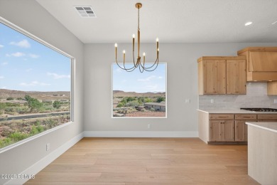 Experience breathtaking views of the city, mountains, and golf on Coral Canyon Golf Course in Utah - for sale on GolfHomes.com, golf home, golf lot