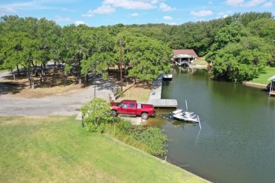 This beautiful hilltop home offers fantastic views of nearby on Apple Rock Golf Course - Horseshoe Bay in Texas - for sale on GolfHomes.com, golf home, golf lot