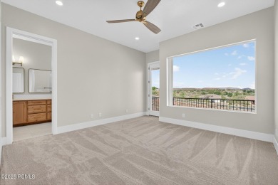 Experience breathtaking views of the city, mountains, and golf on Coral Canyon Golf Course in Utah - for sale on GolfHomes.com, golf home, golf lot