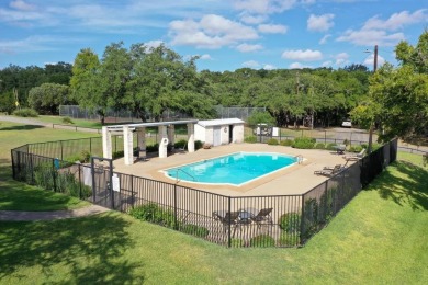 This beautiful hilltop home offers fantastic views of nearby on Apple Rock Golf Course - Horseshoe Bay in Texas - for sale on GolfHomes.com, golf home, golf lot
